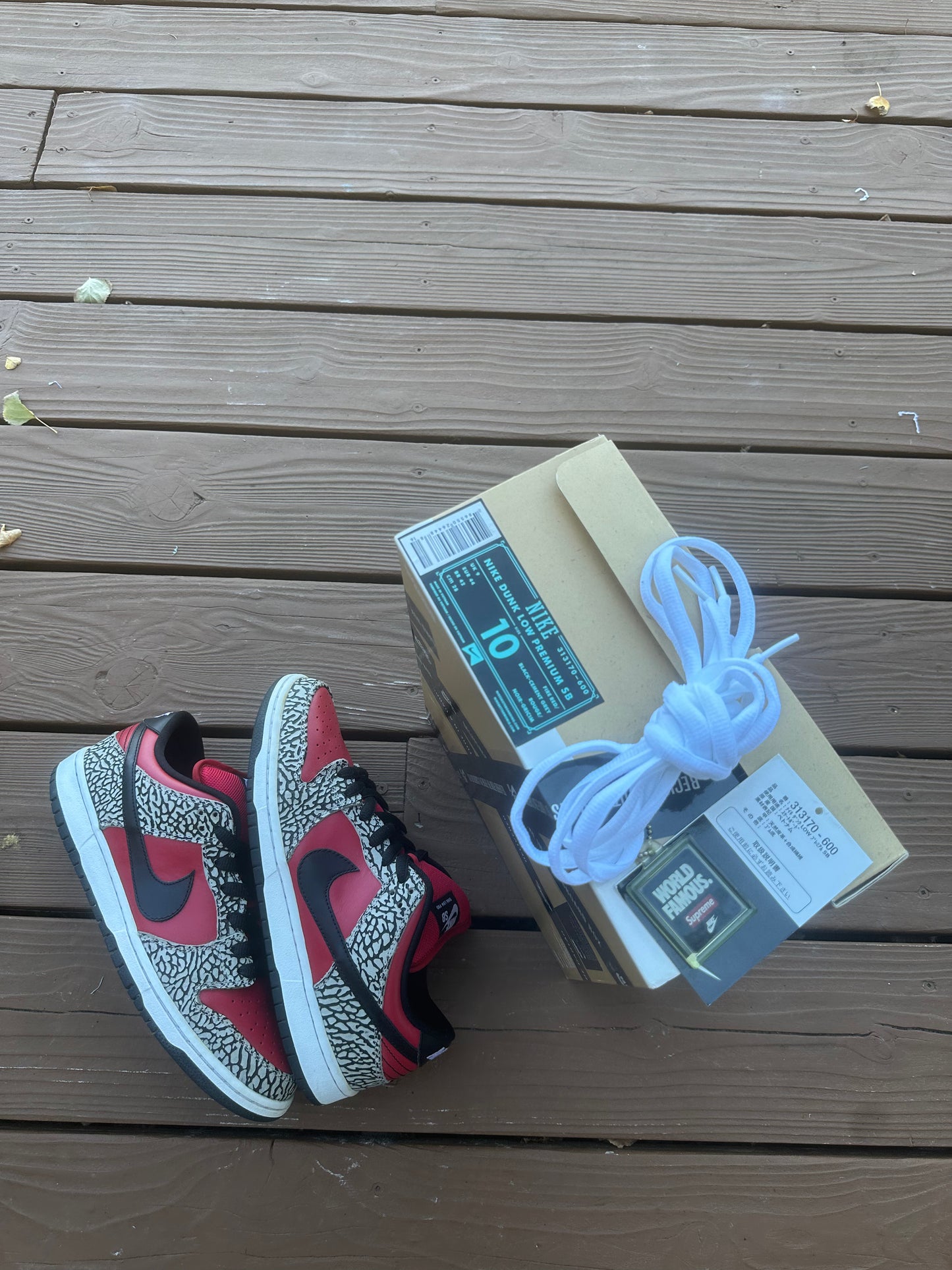 Size 10 - Supreme x Nike SB Dunk Low Premium Red Cement